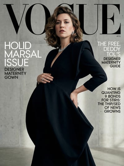 High-fashion maternity magazine cover with pregnant model in black dress, bold masthead, and editorial cover lines.