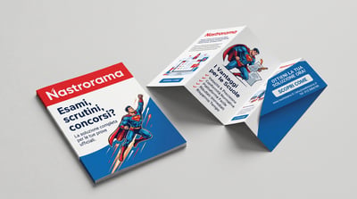 3D mockup of red and blue A4 tri-fold office services brochure with closed front cover, open Z-fold interior panels, superhero artwork, and studio shadows.
