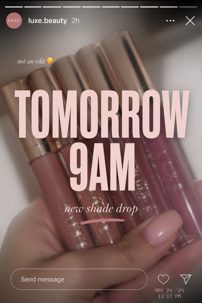 A hand holding five lip gloss tubes with rose gold caps, overlaid with bold pink text saying TOMORROW 9AM and an Instagram Story interface.